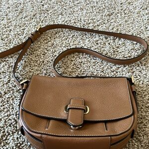 Michael Kors hand bag 10 inches by 8 inches